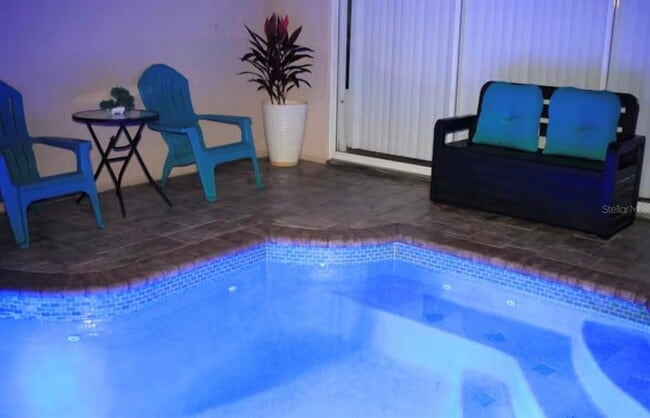 Building Photo - 8117 Princess Palm Ln