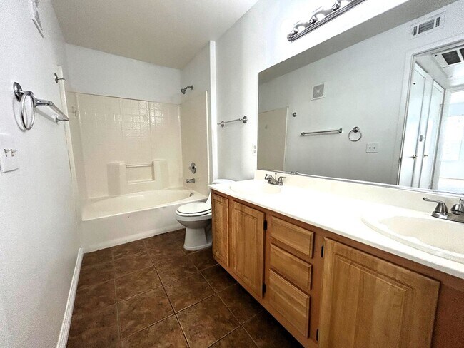 Building Photo - Second-Floor Condo with Private Balcony in Gated Canyon Willows Communit