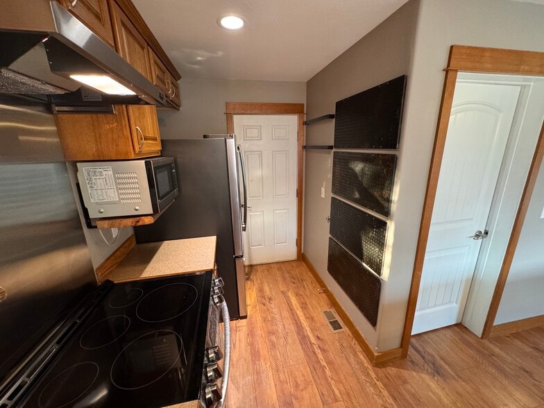 Custom Metal Peg Boards in Kitchen - 5485 Glenellen Dr