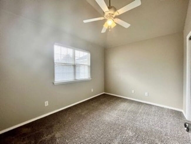 Building Photo - Spacious 3-Bed, 2.5-Bath Fourplex with Gar...