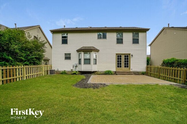 Building Photo - 5947 Heritage Farms Dr