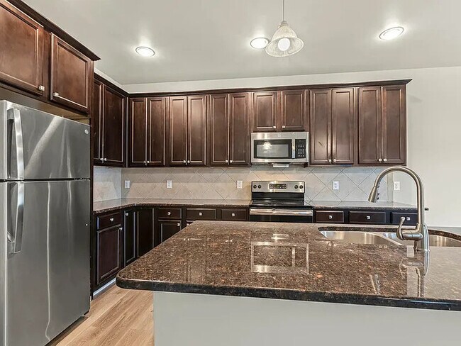 Building Photo - Earn Wealth While Leasing - Like a Homeown...