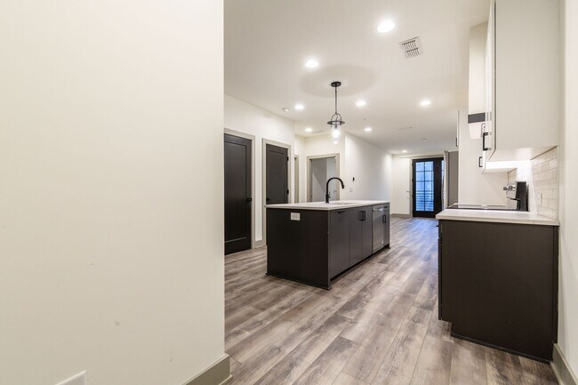Building Photo - Modern Living Meets Walkable City Charm in...