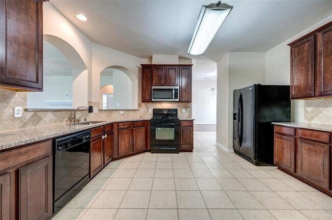Building Photo - 7414 Compass Rose Dr