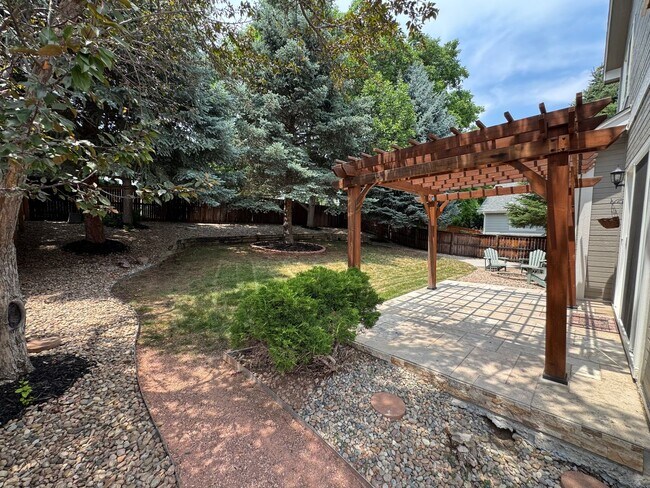 Building Photo - Available for Rent in Lone Tree's Desirable Carriage Club Neighborhood!