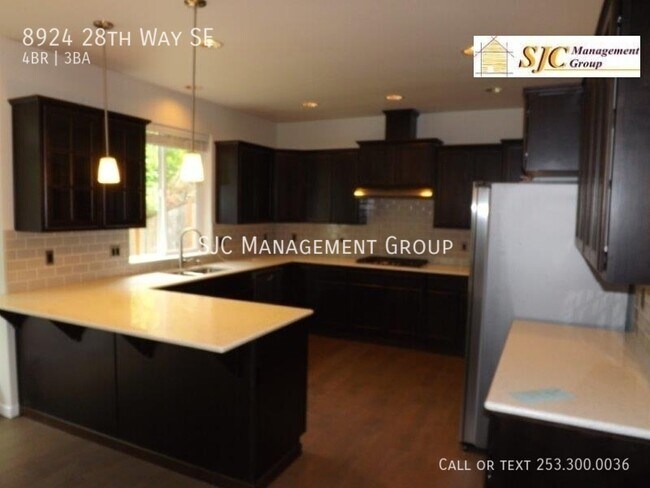 Building Photo - 8924 28th Way SE