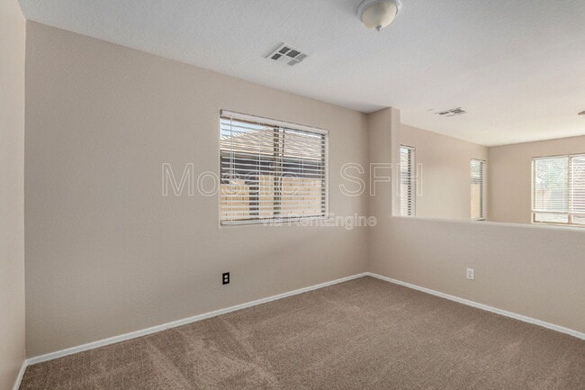 Building Photo - 5215 W Hasan Dr