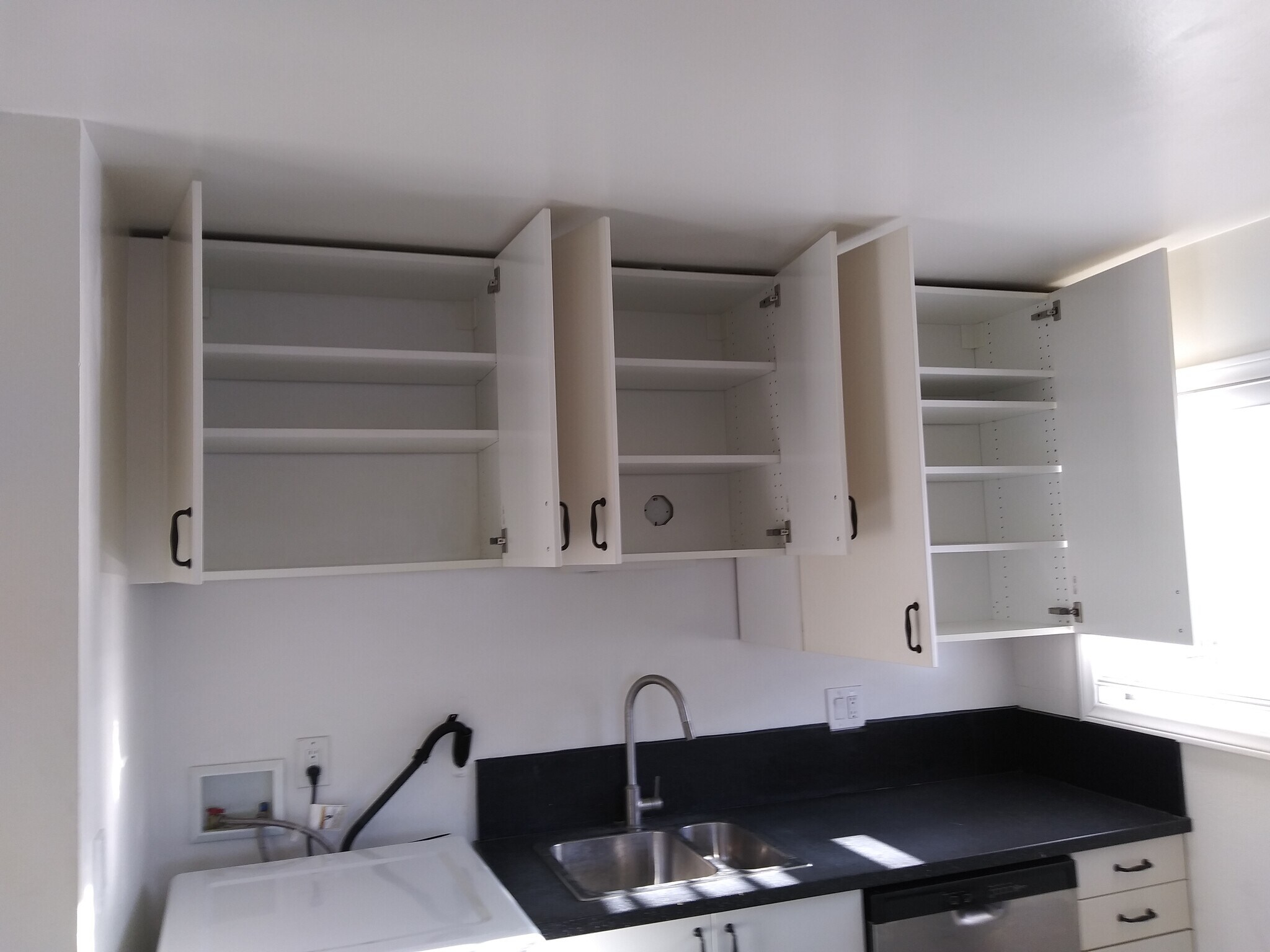 Cabinets above counter - 1608 260th St