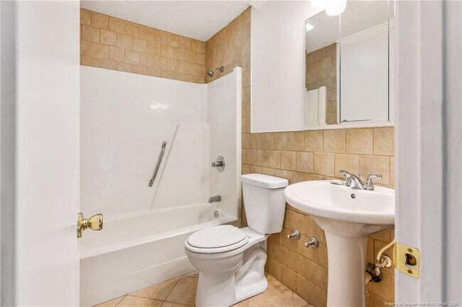 Building Photo - 6837 Woodmark Dr