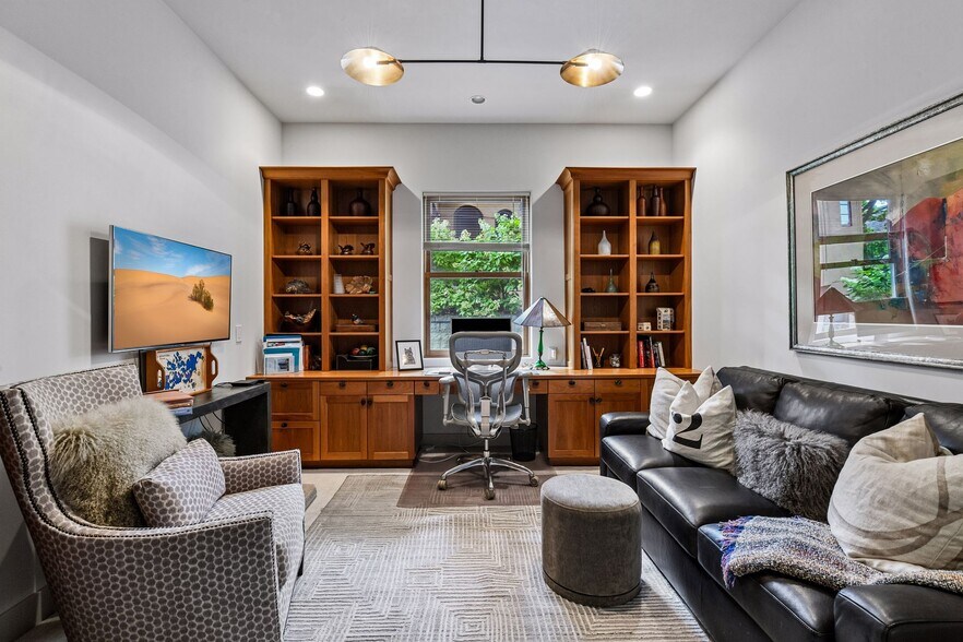 Designated home office space on the main level with built-ins to keep files organized - 745 Rice St E