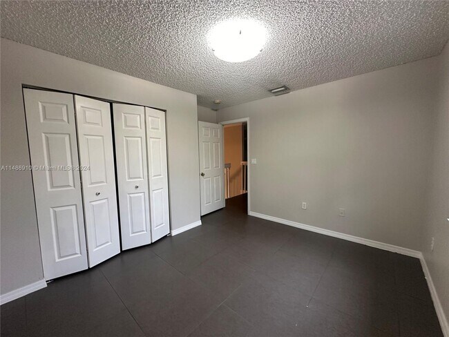 Building Photo - 10790 NW 52nd St