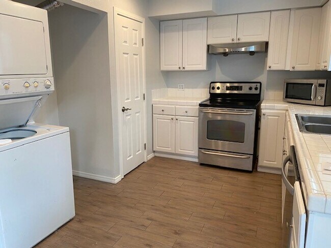 Building Photo - **Coming Soon ** Spacious 4-Bedroom Townho...
