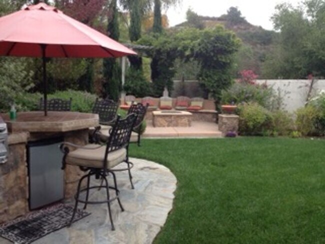 Building Photo - Former Model Home in Gated Carmel Valley Community with Spa & Outdoor Kitchen