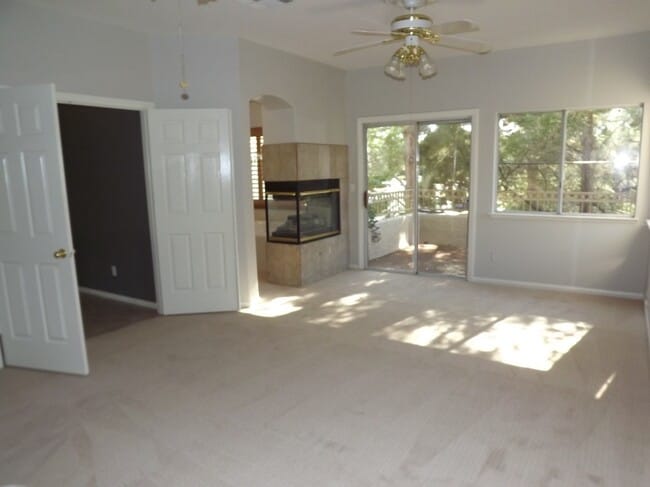 Building Photo - Gated Green Valley Ranch Townhome | 2 Bed | 2.5 Bath | 2-Car Garage