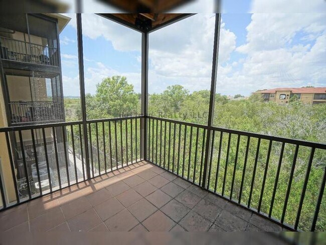 Building Photo - Beach Walk Condo | 2BR/2BA with Bay Views