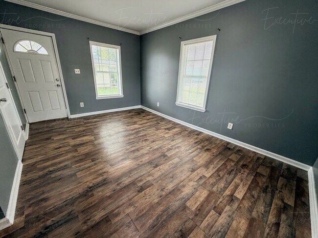 Building Photo - Move-In Ready in Sulphur | Updated 2BR Home w/ Covered Front Porch + Granite Countertops