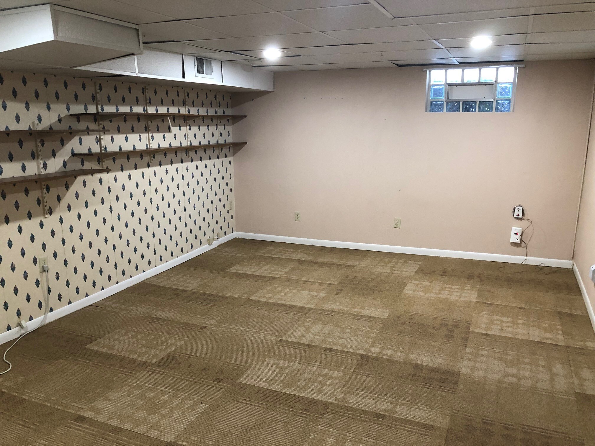 Basement room - perfect for a home office or TV room. - 6959 Pernod Ave