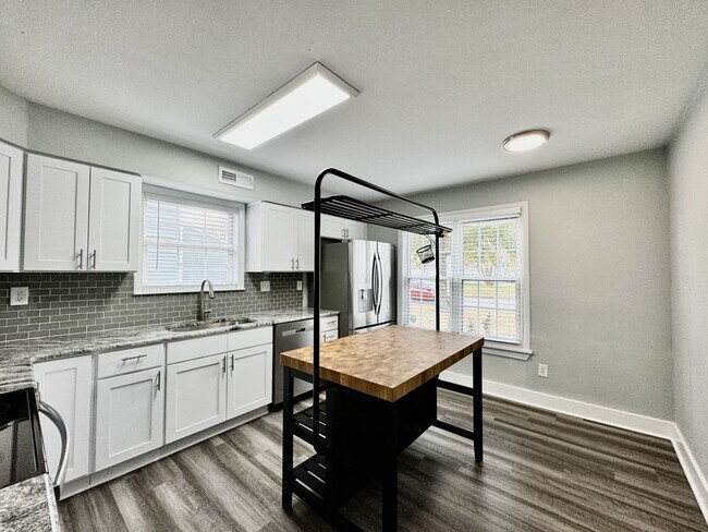 Building Photo - Updated & Ready For You On 12-05-25! A Pet-Friendly Home w/Attached Garage, All Appliances Convey...