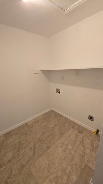 Laundry Hookups and Storage - 6140 S Springbrook Dr