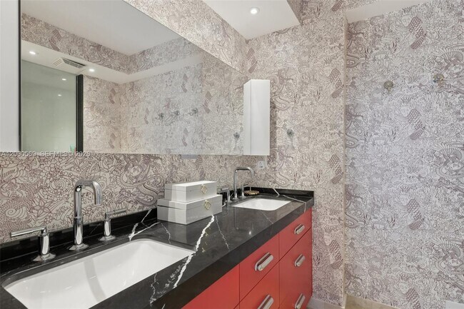 Building Photo - 10275 Collins Ave