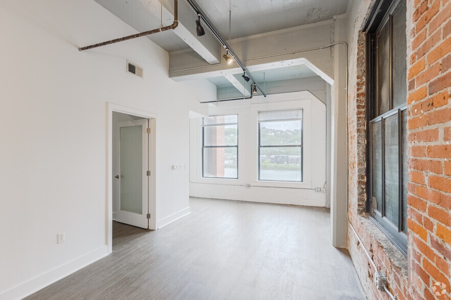 2BR, 1.5BA - 850SF - Living Room - 1st Avenue Lofts
