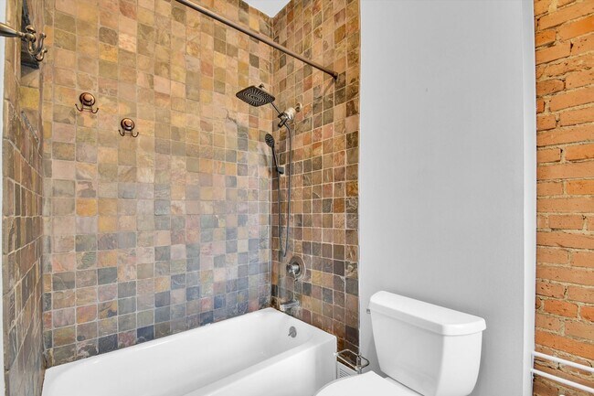 Building Photo - Architecturally Stunning Curtis Park Townhome With Historic Charm