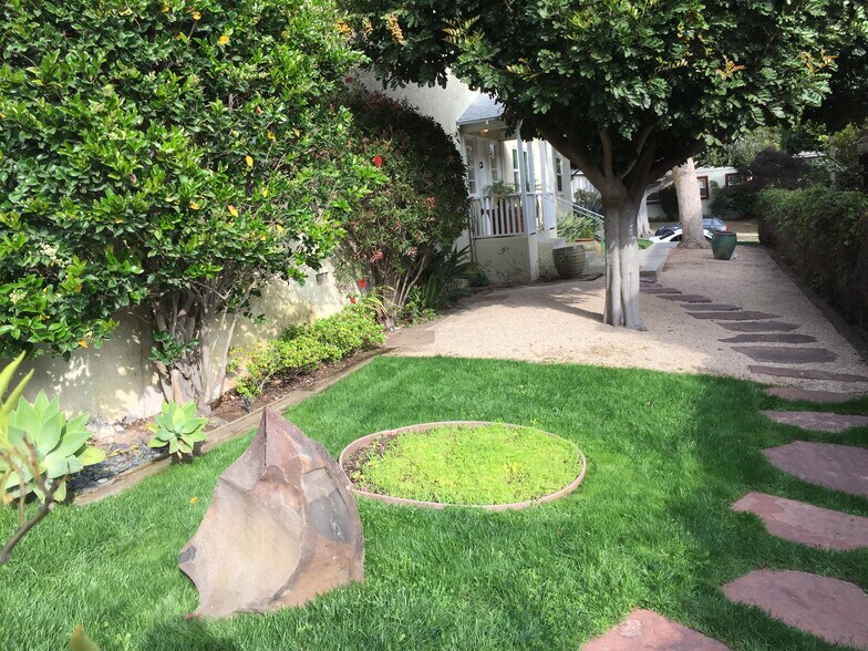 Well-maintained landscaping. Weekly garden service - 1131 Bay Street