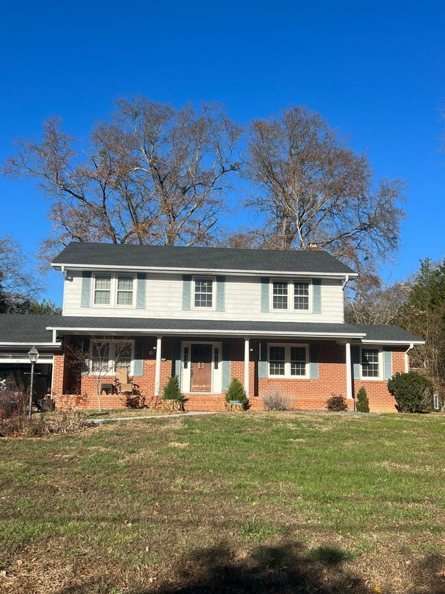 Primary Photo - 4 Bedroom with fenced in yard!
