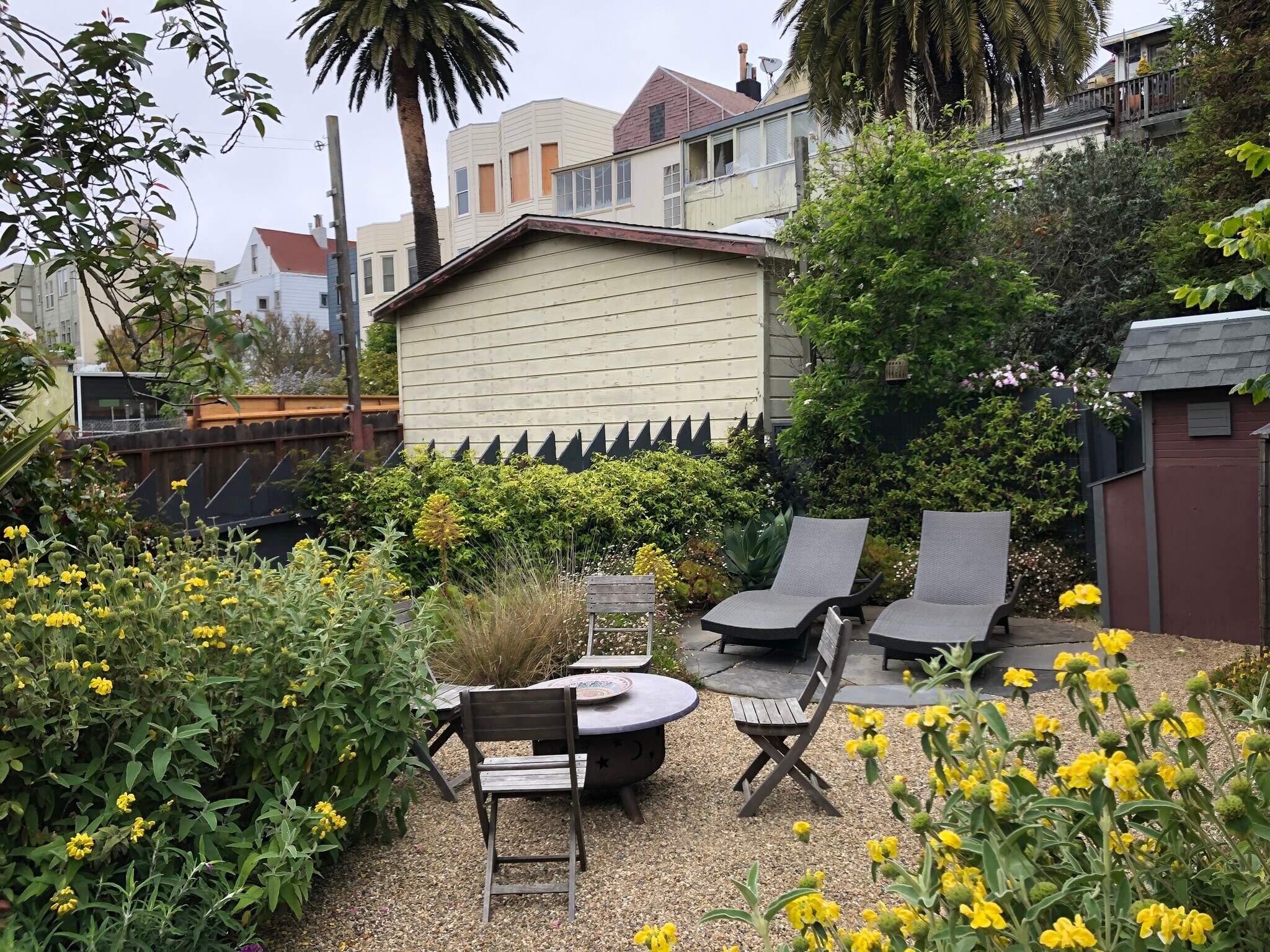 Sunny shared backyard designer garden with BBQ and fire pit. - 1528 Fulton Street