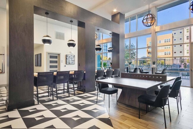 Bask in natural light with huge windows in the dining and lounge area, creating an inviting space for any occasion. - Windsor Metro West