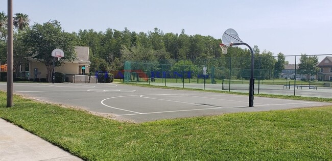 Building Photo - 4 BR / 3 FULL BATH (INCLUDES 2 MASTERS) 2 STORY (NEAR DISNEY!) GATED COMMUNITY WITH COMMUNITY POO...