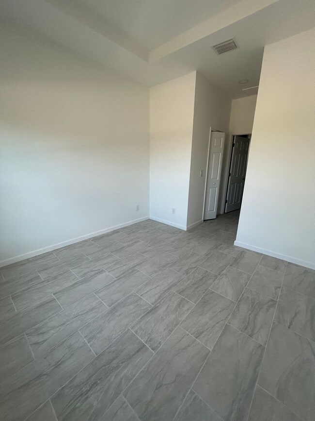 Building Photo - JUST BUILT! Spacious 4/2/2 Home -Perfect for Your Family in SW Lehigh Acres