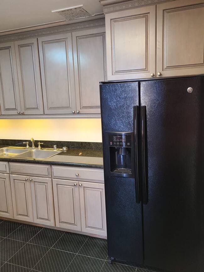 Right side kitchen and refrigerator - 500 University Ave