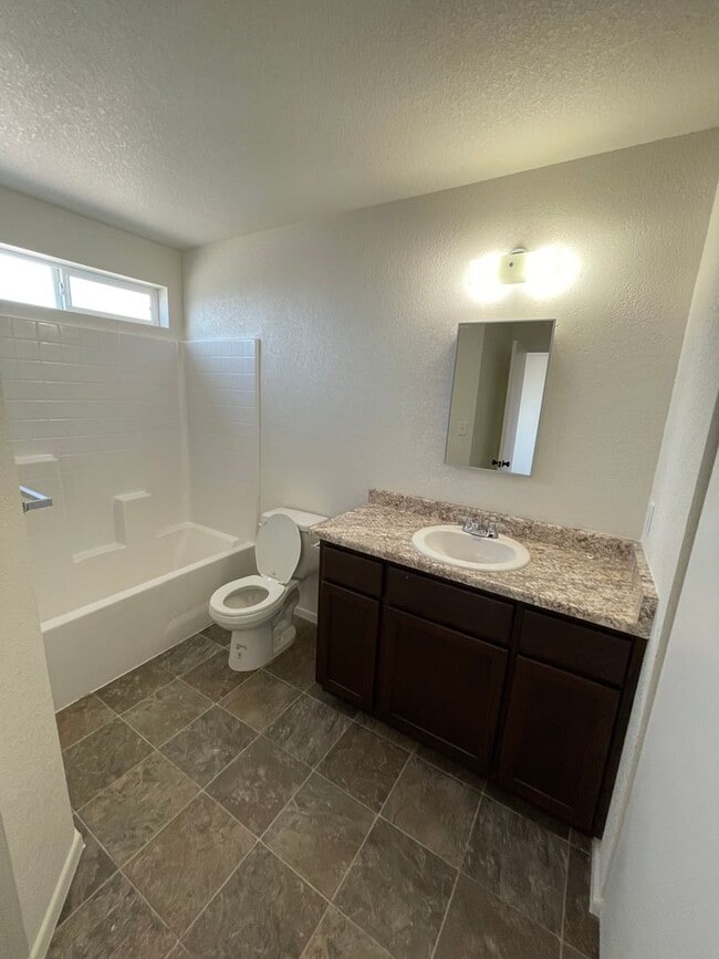 Building Photo - NEARLY NEW Home in the Desired Desert Sands Subdivision!