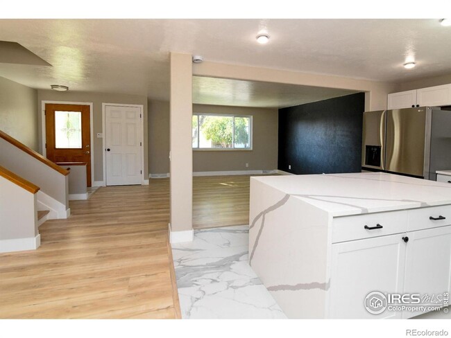 Building Photo - Remodeled home with separate finished base...