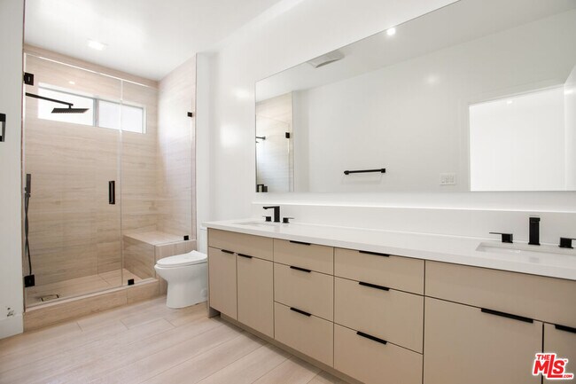 Building Photo - 10630 Wilkins Ave