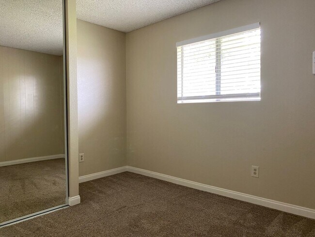 Building Photo - LOCATION & PRIVACY! Spacious 3 br Condo wi...