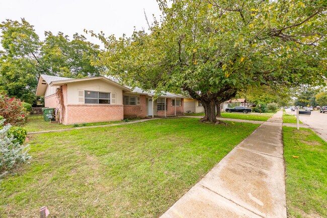 Front yard left side. - 1816 E Tucker Blvd