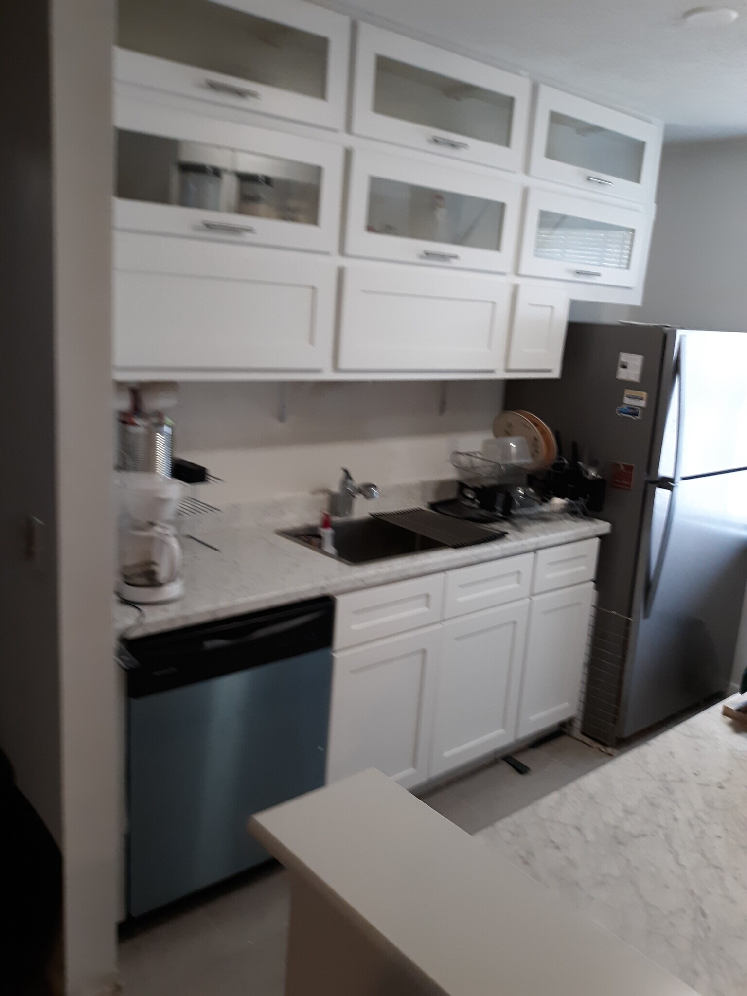 Kitchen with pots,glasses,dishes - 552 Wimbledon Ct