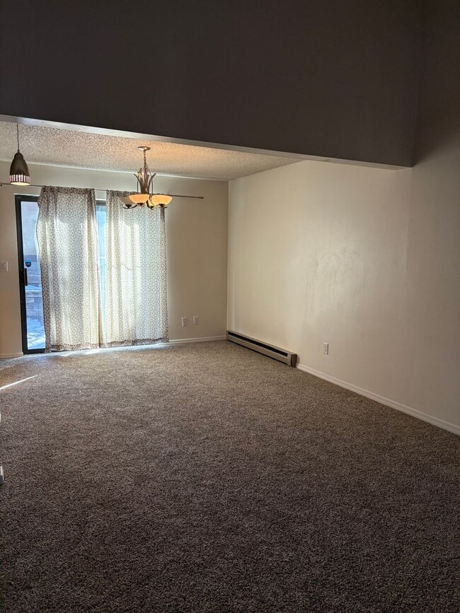 Building Photo - 1 Bedroom 1 Bath Townhome with Garage Parking in Village Seven