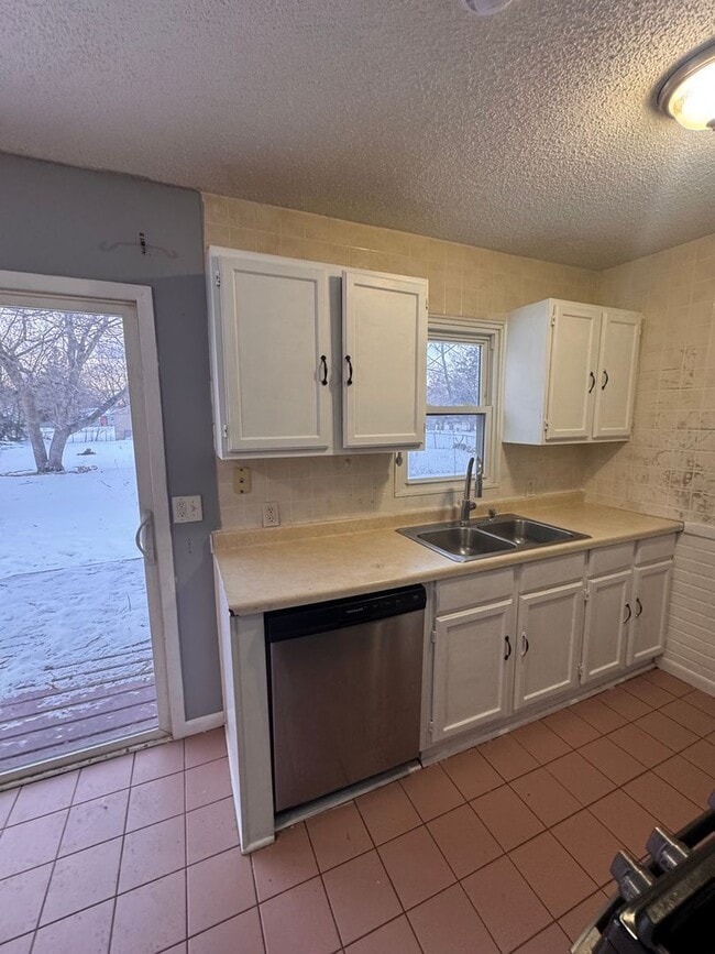 Building Photo - AVAILABLE NOW - Nicely rehabbed 3 Bedroom Single Family Home with Garage and Very Large Backyard