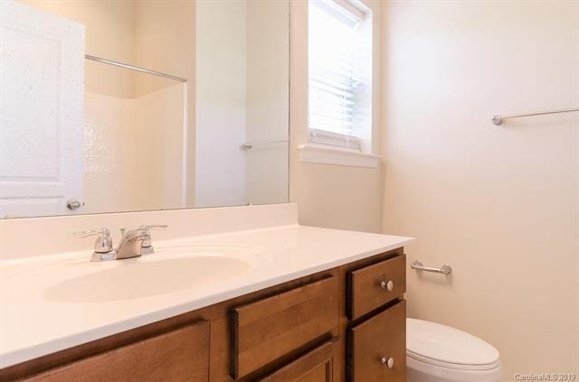 Building Photo - "Charming 3-Bed Oasis with Granite Accents & Pool Retreat in Belmont!"