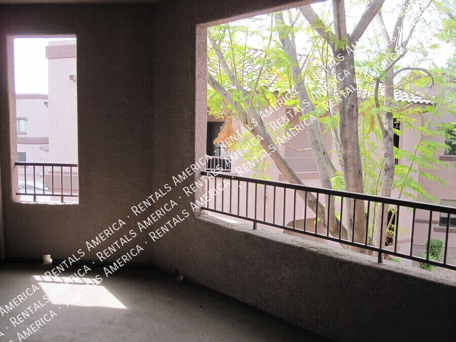 Building Photo - 9555 E Raintree Dr