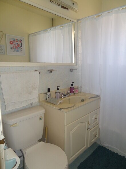 half bath with shower tub - 2305 NW 50th St