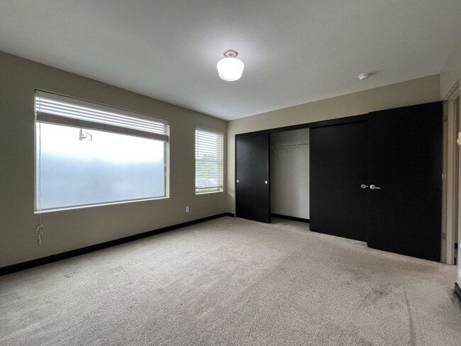 Building Photo - Charming 3 Bedroom, 2.5 Bathroom Home with Large Living Room, Tall Windows, Island Kitchen, and A...