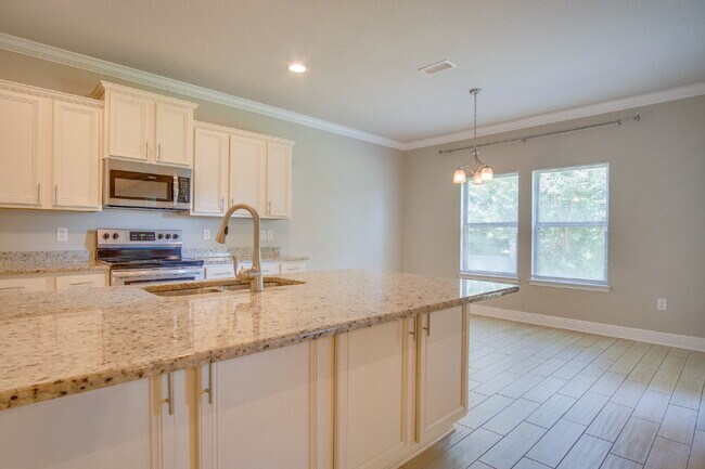 Building Photo - Spacious 4BR Pool Home with Modern Upgrade...