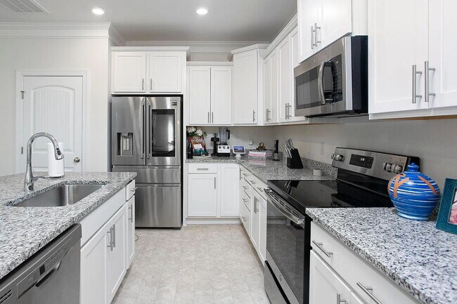 Building Photo - Gorgeous Garner Home with Primary on Main ...