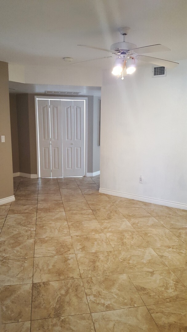Building Photo - Three Bedroom Southwest Condo, Tile, Ground Floor