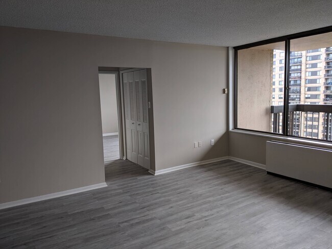 Living room and passage to bedroom - 3701 S George Mason Dr