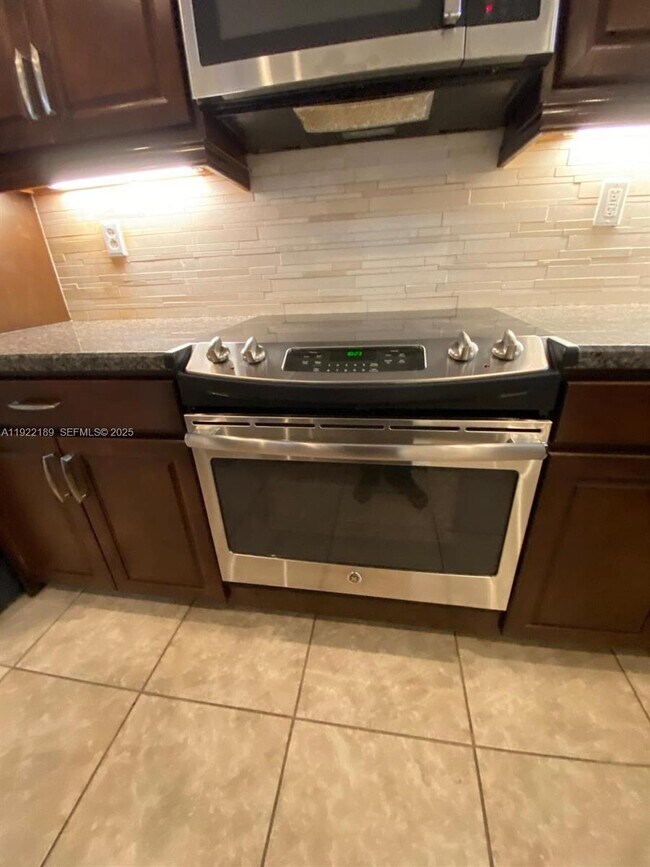 Building Photo - 9823 W 34th Ln